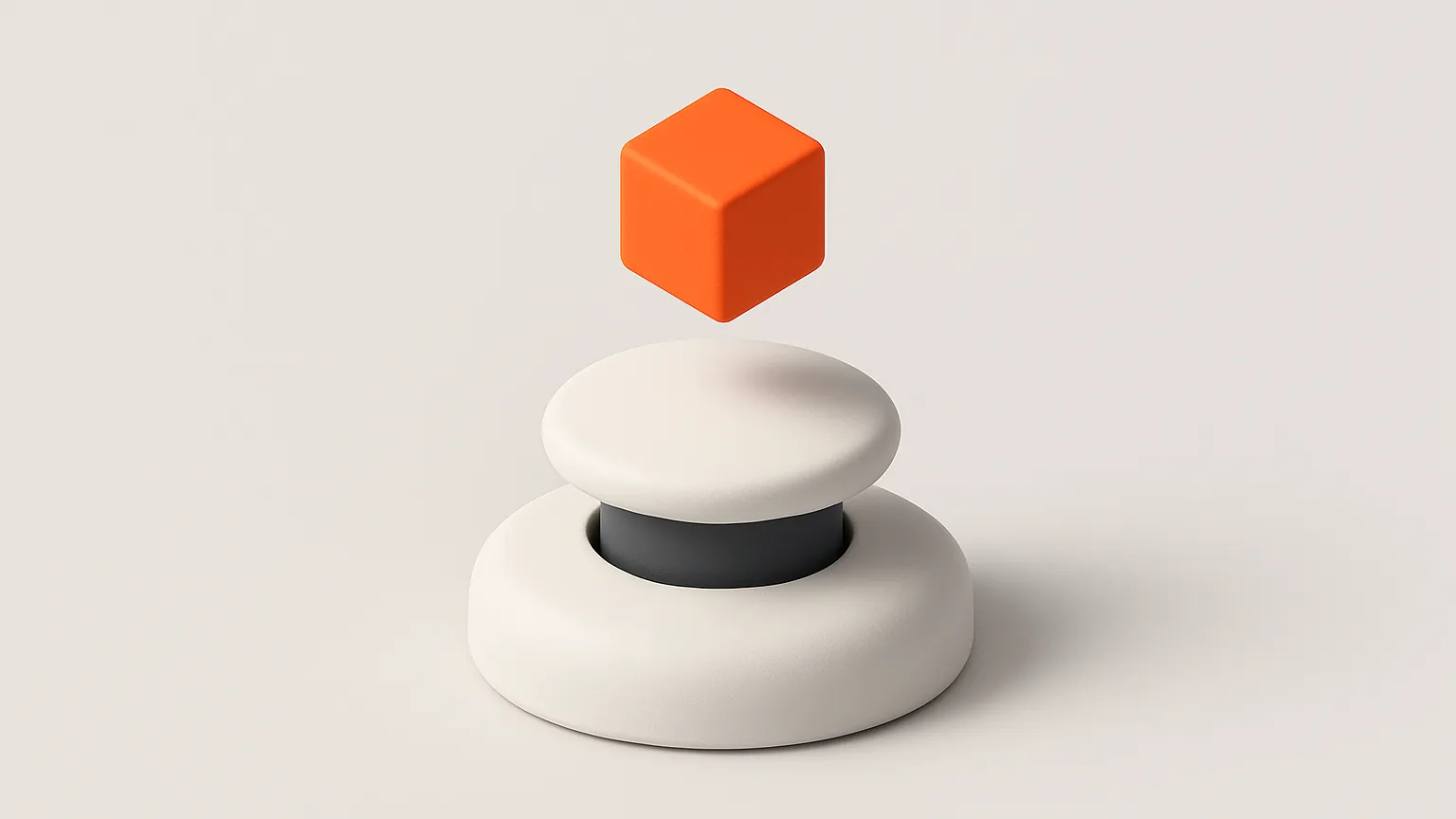 A large white push button with a small orange cube popping up above it